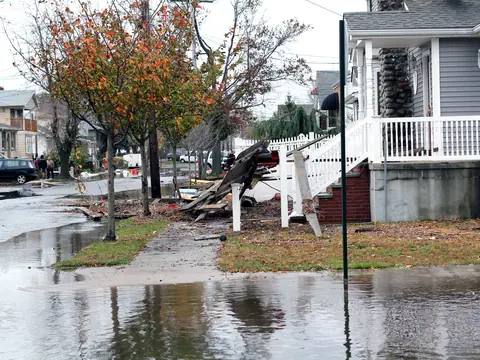 A flooded corner of a residential street in Howard Beach, Queens, after Hurricane Sandy